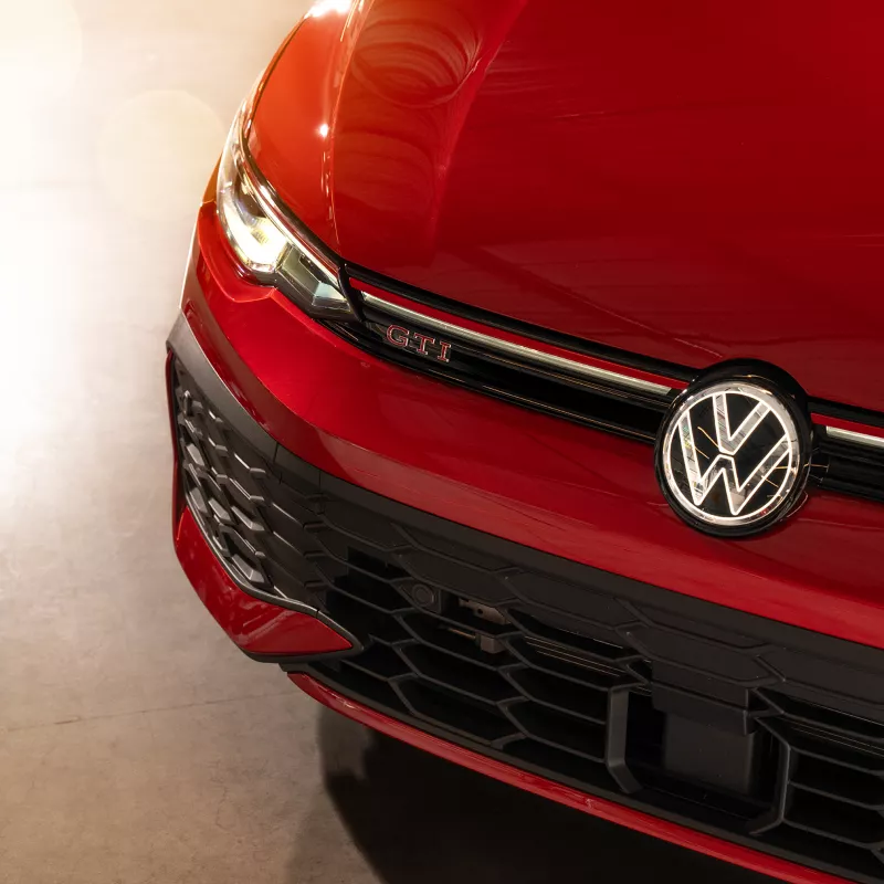 2026 Volkswagen Golf GTI front grille and VW logo detail