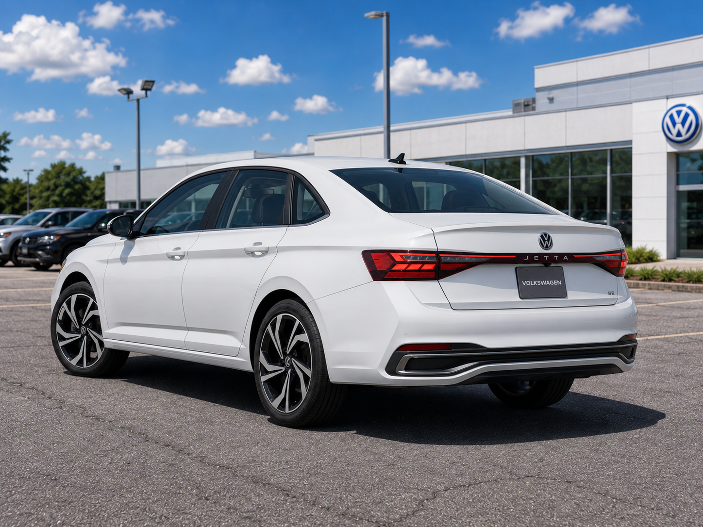 2026 Volkswagen Jetta SEL rear three-quarter view with trunk-lid LED light bar