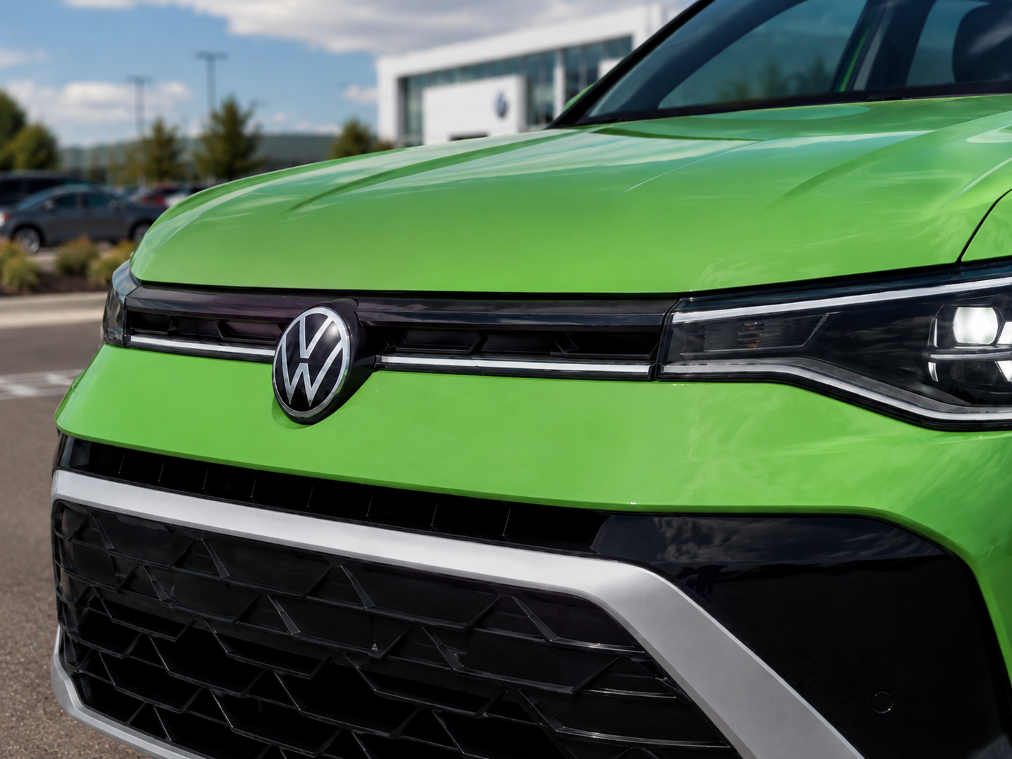 2026 Volkswagen Taos SE front view featuring adaptive LED headlights and horizontal grille design